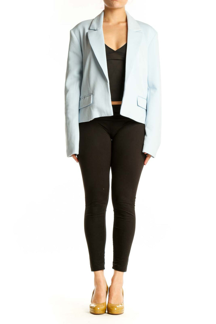 Light blue cropped blazer by Steve Madden worn with black top, front view showing notch lapels and structured fit
