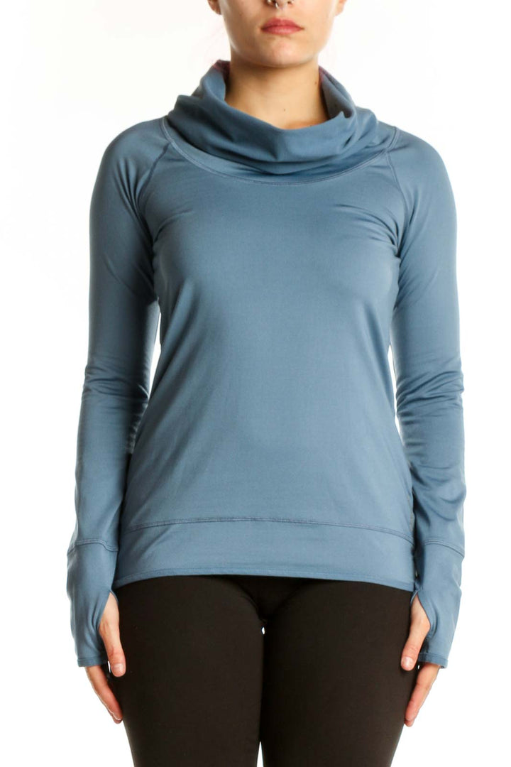 Blue cowl neck activewear top with long sleeves, front view on model