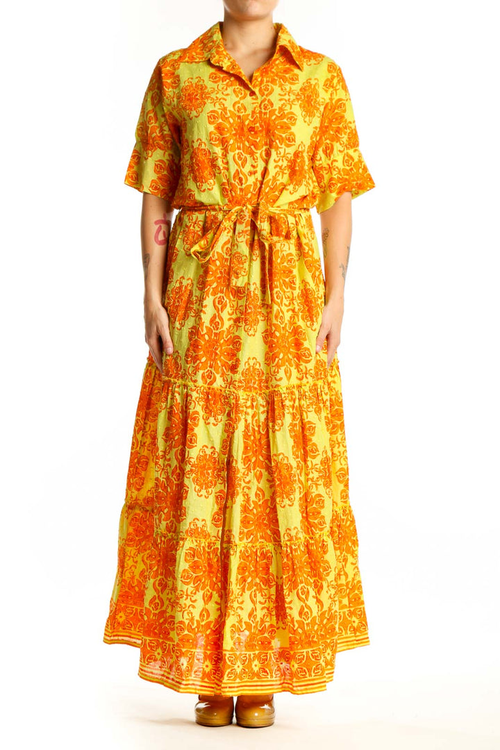Yellow and orange floral cotton maxi dress with button-front, collar, and tiered skirt - front view