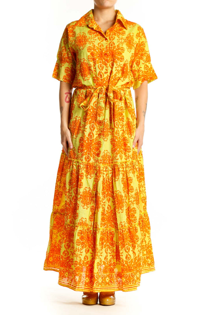 Yellow and orange floral cotton maxi dress with button-front, collar, and tiered skirt - front view
