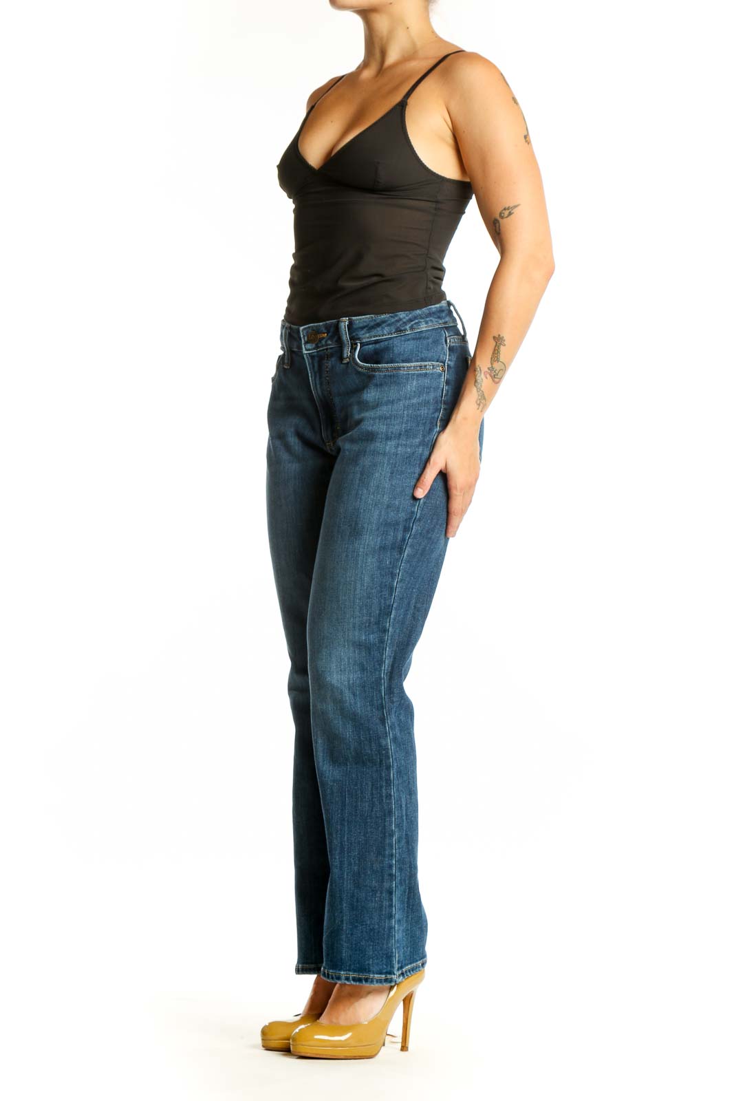 Front view of blue Lee flare jeans with high-rise waist and classic five-pocket design on model
