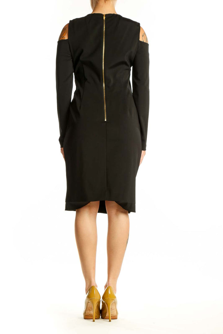 DKNY black cold shoulder wrap dress with long sleeves and wrap detail, back view