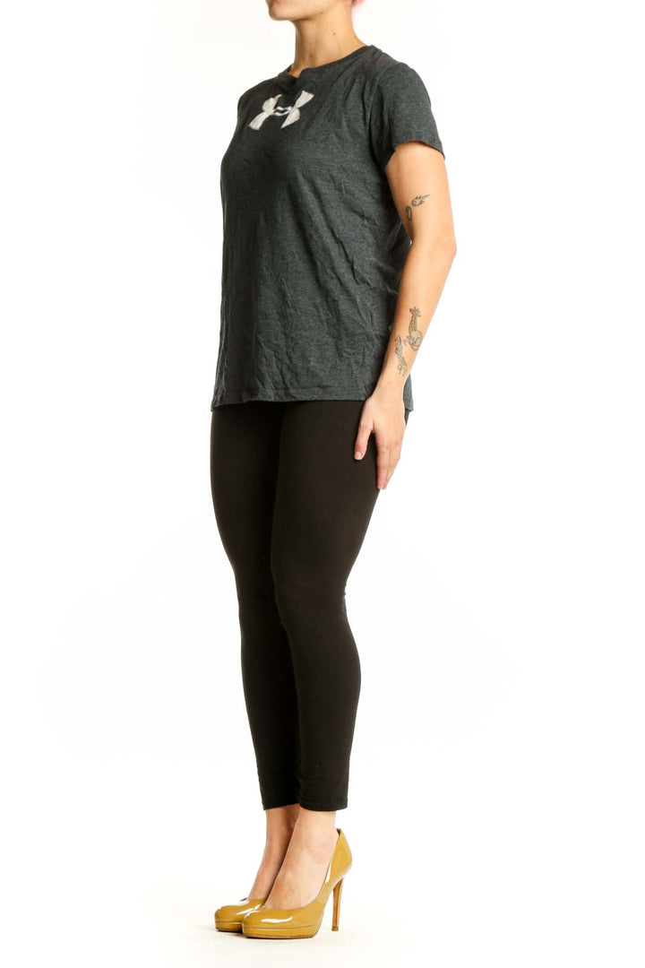Charcoal gray Under Armour women's t-shirt with white logo graphic on chest, front view
