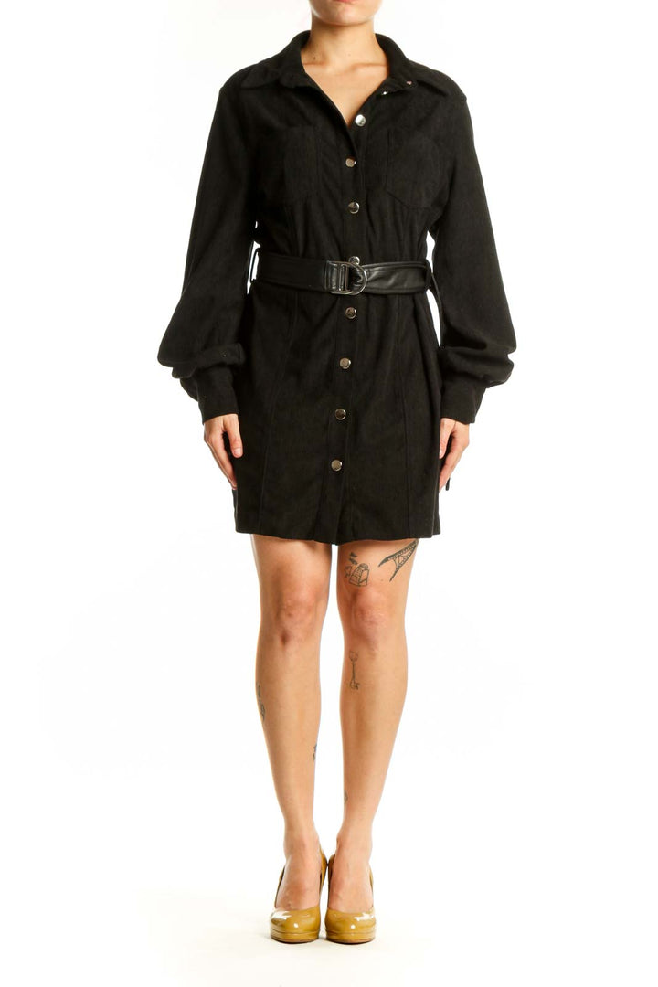 Black button-front shirt dress with blouson sleeves and black leather belt, front view