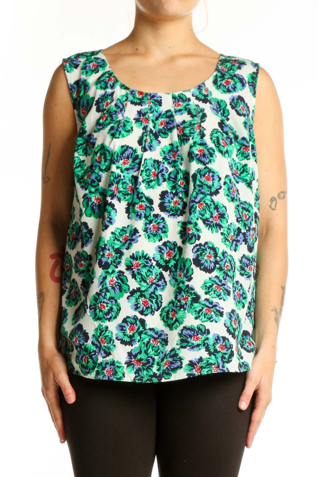 Cream sleeveless tank top with green and multicolor floral print, front view