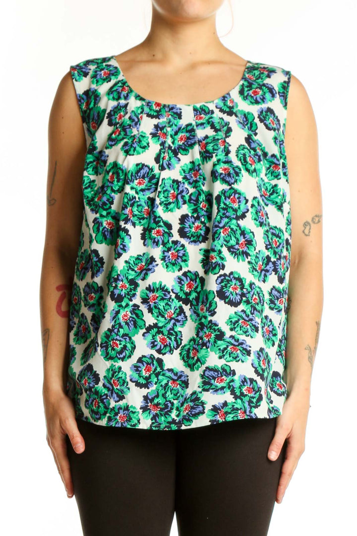 Cream sleeveless tank top with green and multicolor floral print, front view