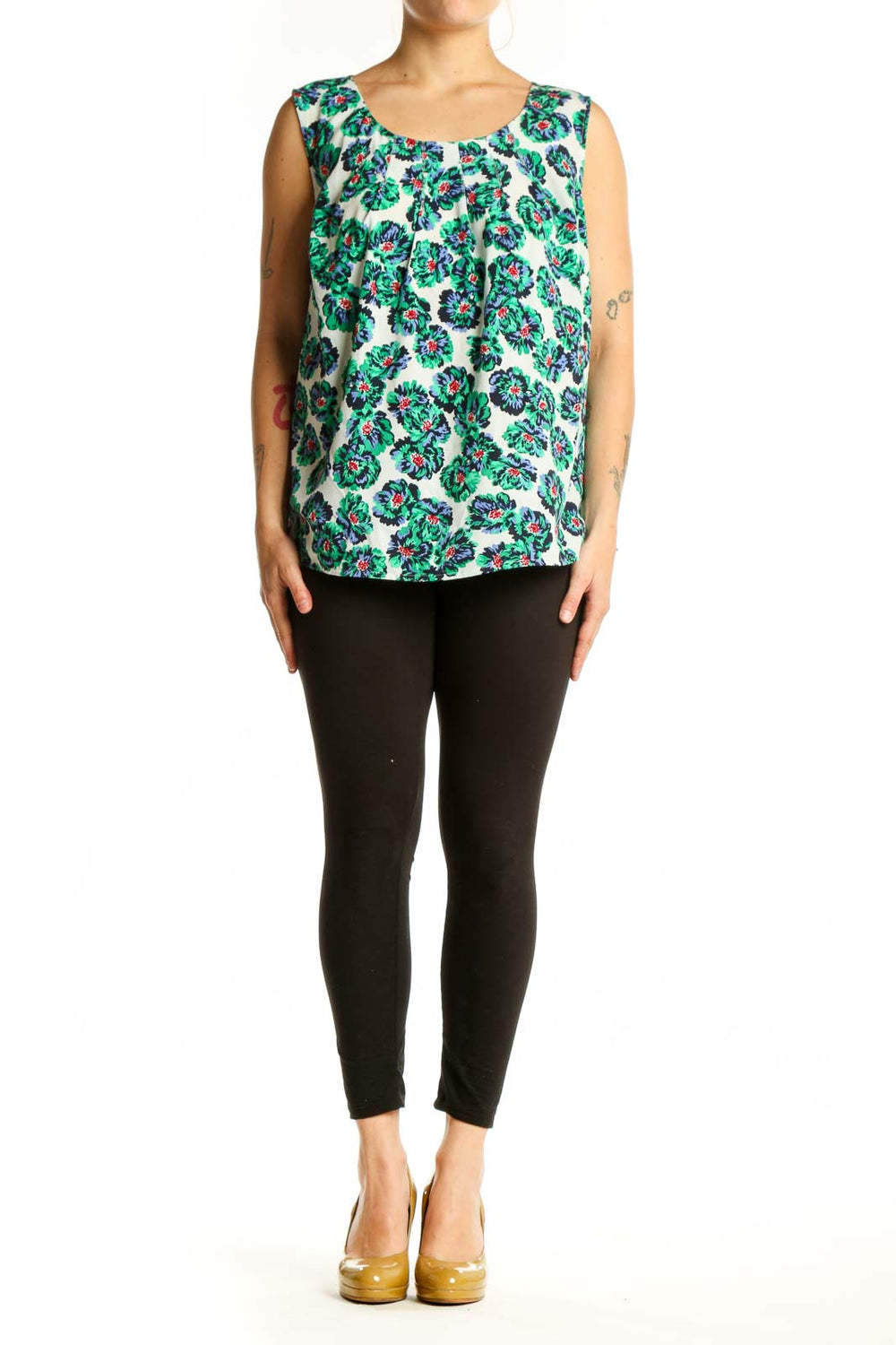 Cream sleeveless tank top with green and multicolor floral print, front view