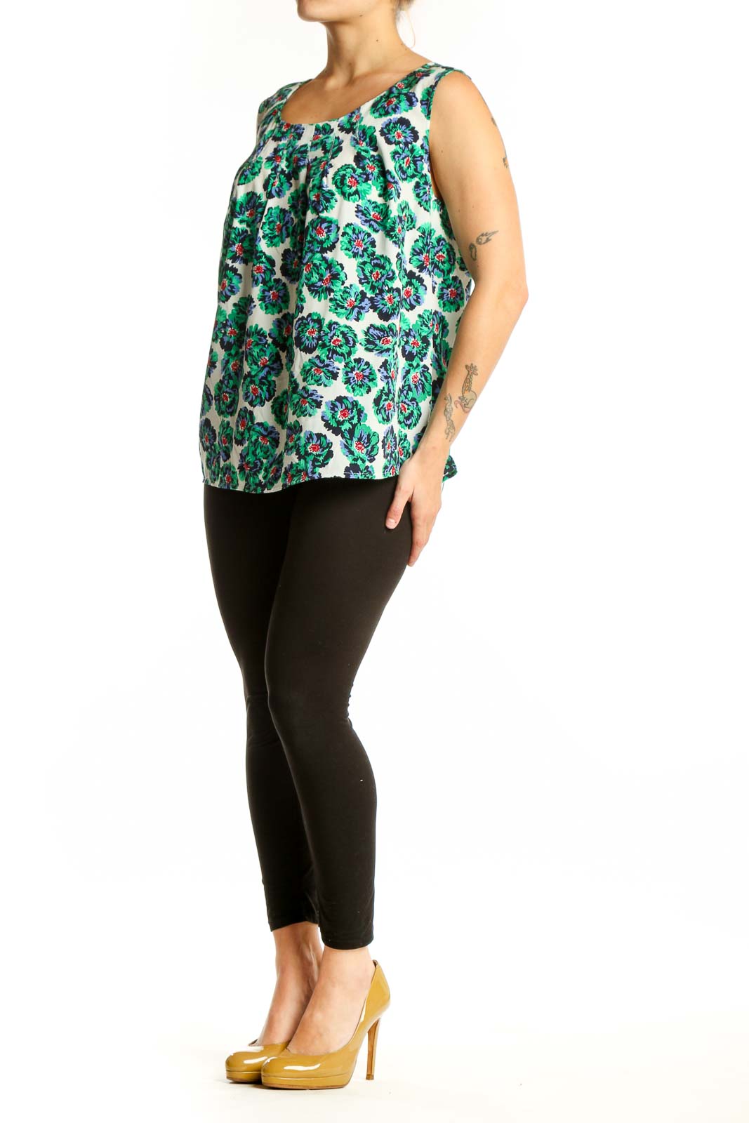 Cream sleeveless tank top with green and multicolor floral print, front view