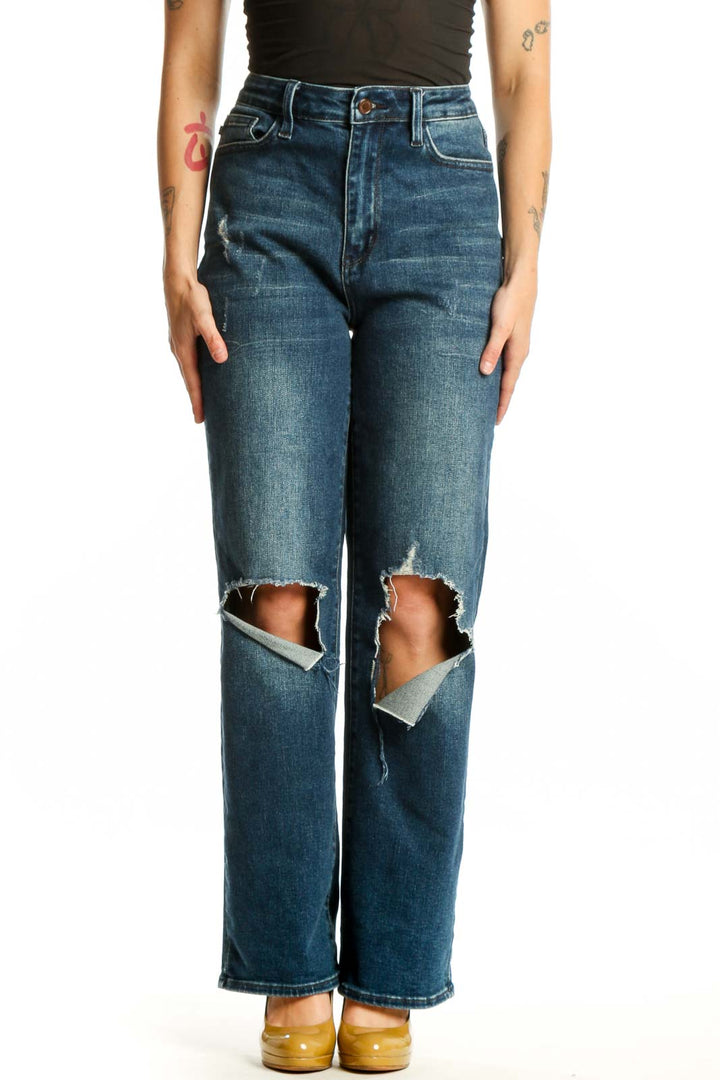 Front view of blue distressed knee rip denim jeans with medium wash and ripped detailing at knees