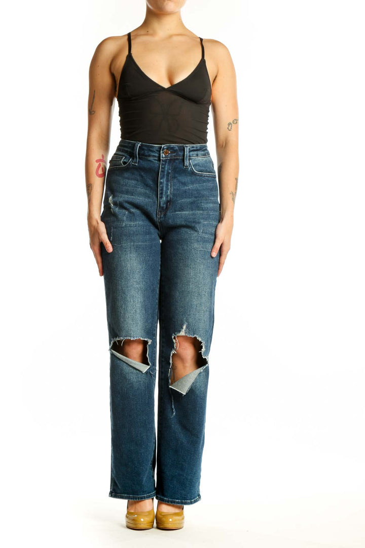 Front view of blue distressed knee rip denim jeans with medium wash and ripped detailing at knees