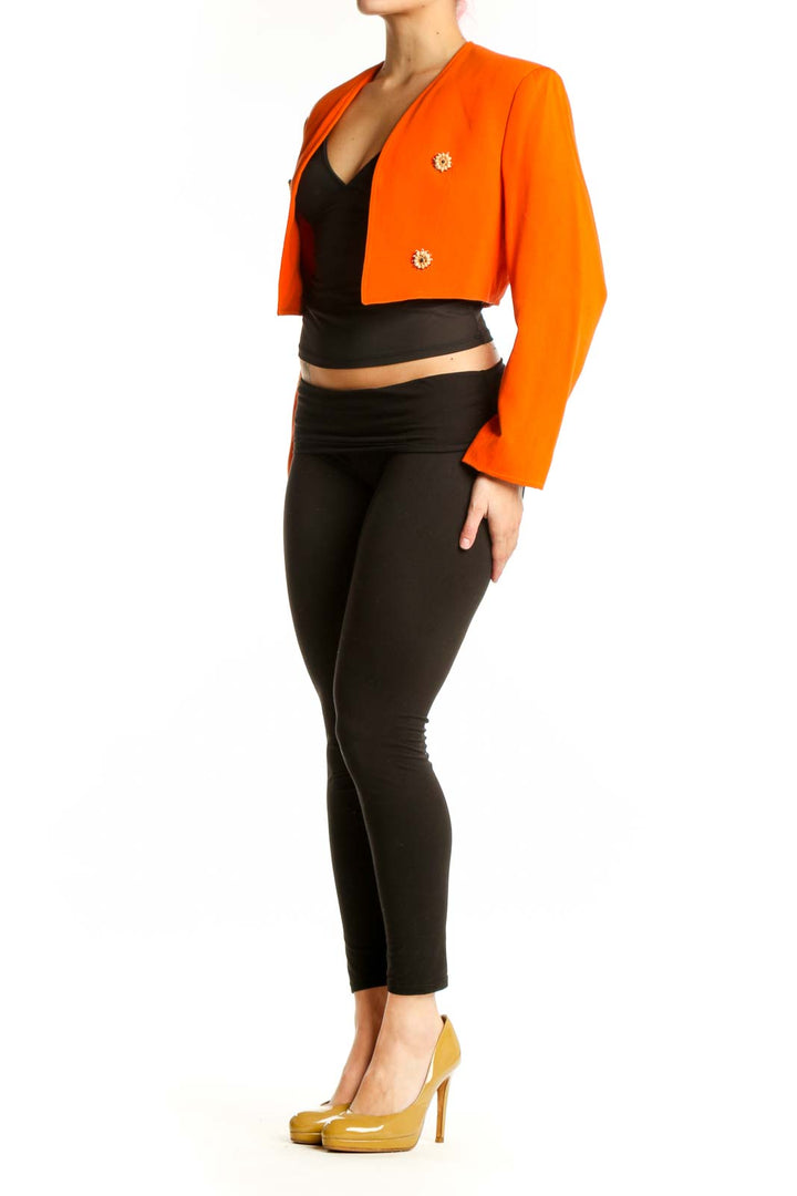 Orange cropped blazer with jeweled buttons by Emporio Armani, front view