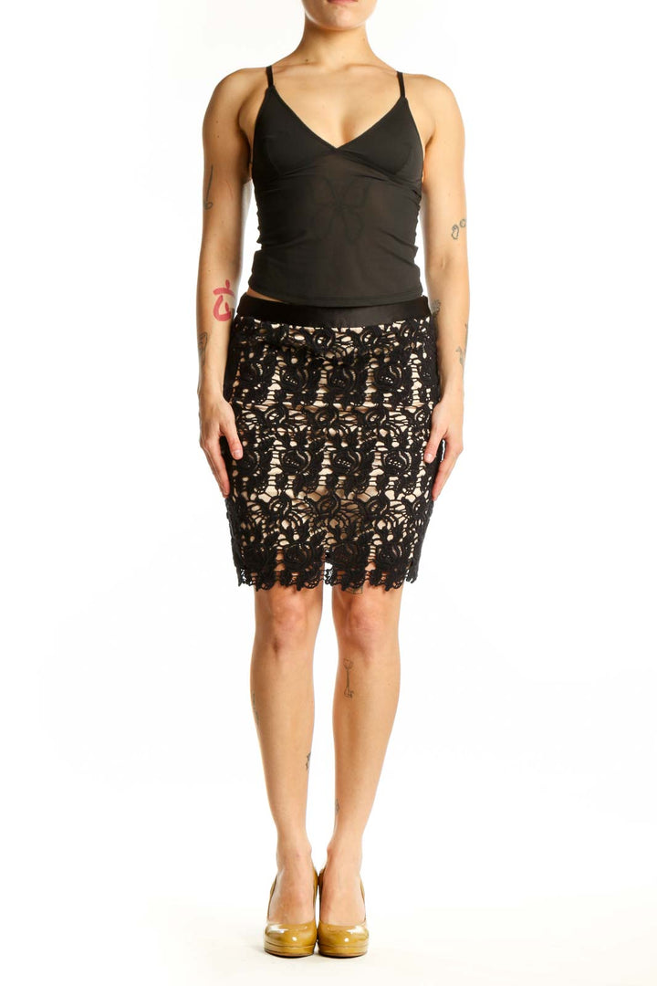 Black lace pencil skirt with scalloped hem and sheer lace overlay by Willi Smith, front view