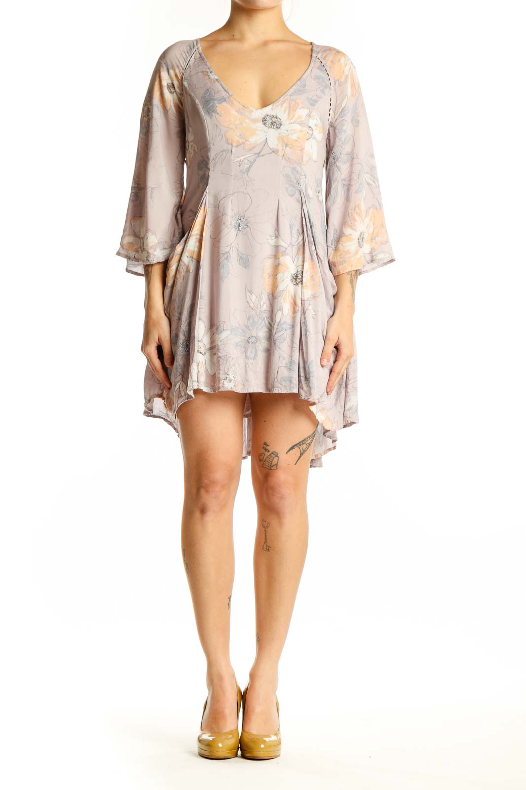 Beige floral print Free People dress with V-neckline and bell sleeves, front view
