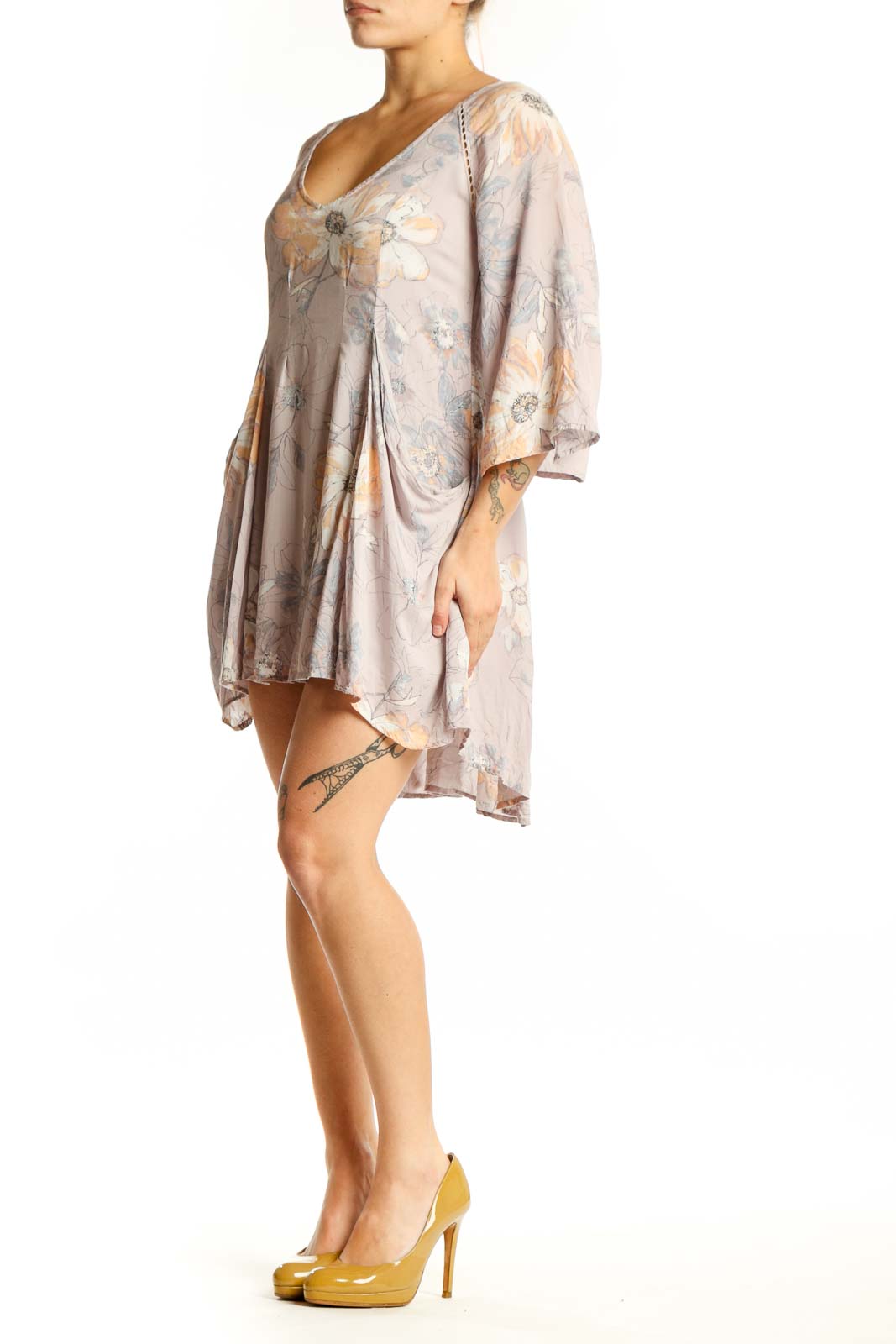 Beige floral print Free People dress with V-neckline and bell sleeves, front view