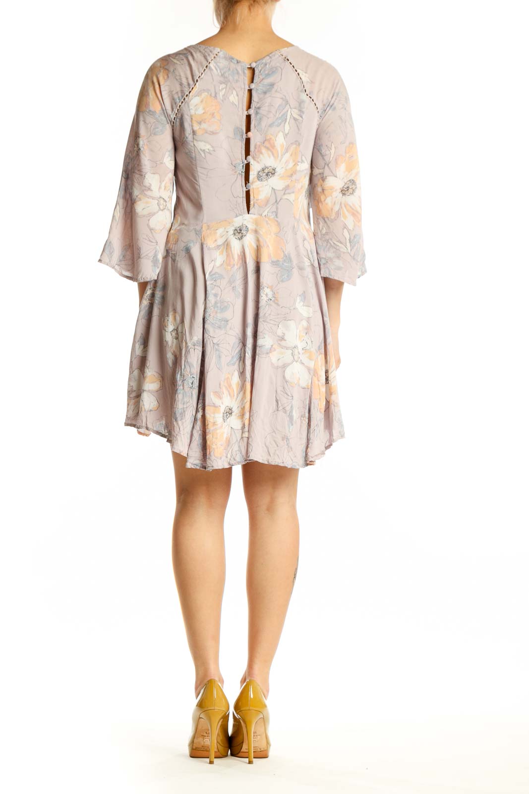 Beige floral print Free People dress with high-low hemline, back view