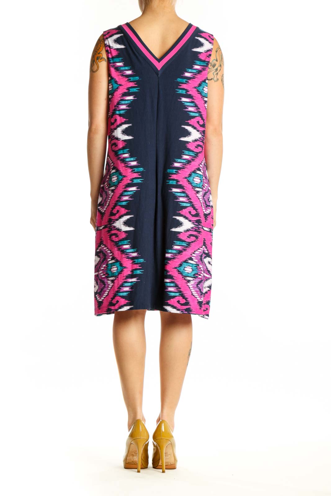 Navy geometric print sleeveless dress with magenta trim, back view