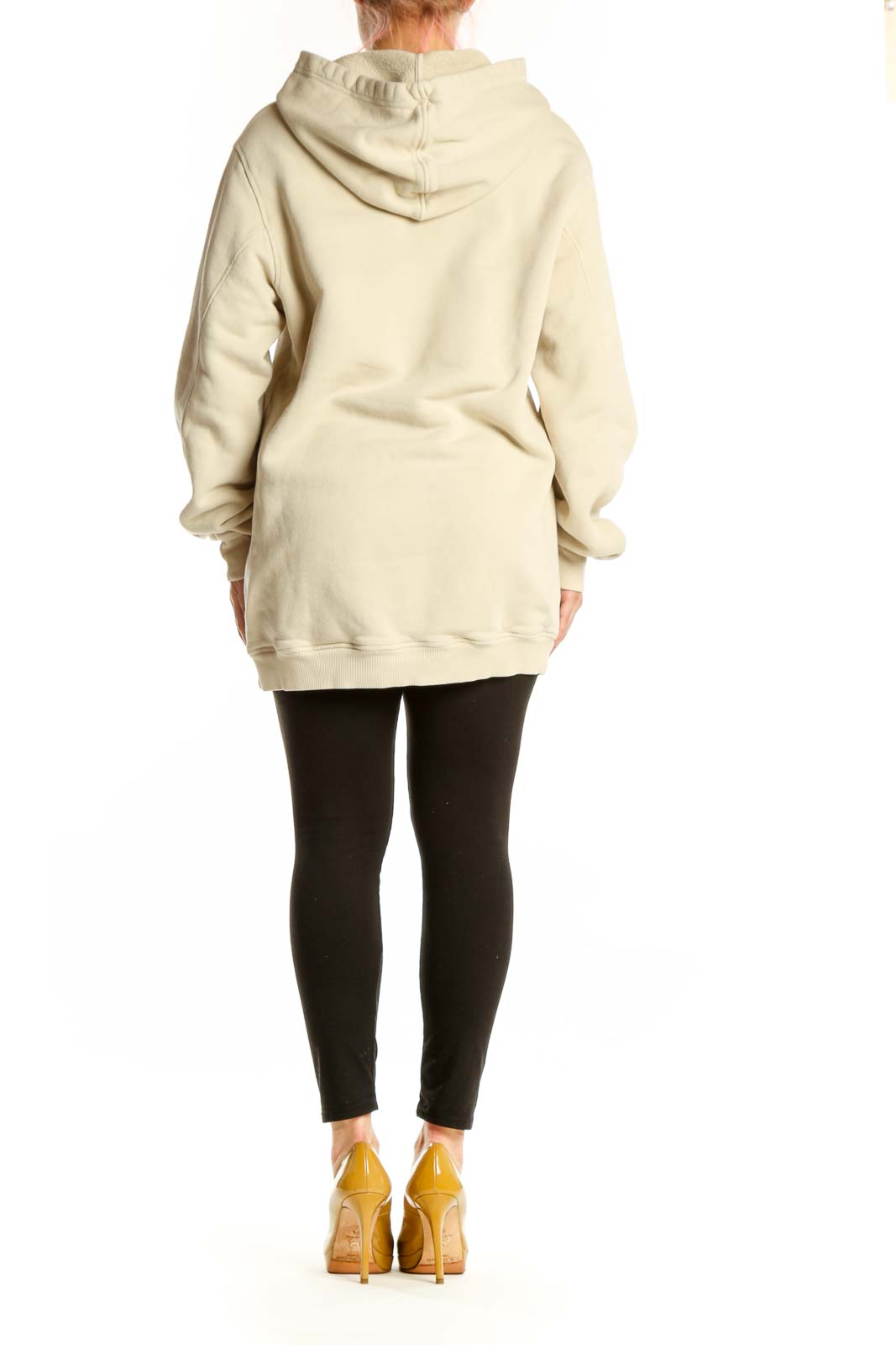 Back view of cream organic cotton hoodie sweatshirt showing hood and relaxed silhouette