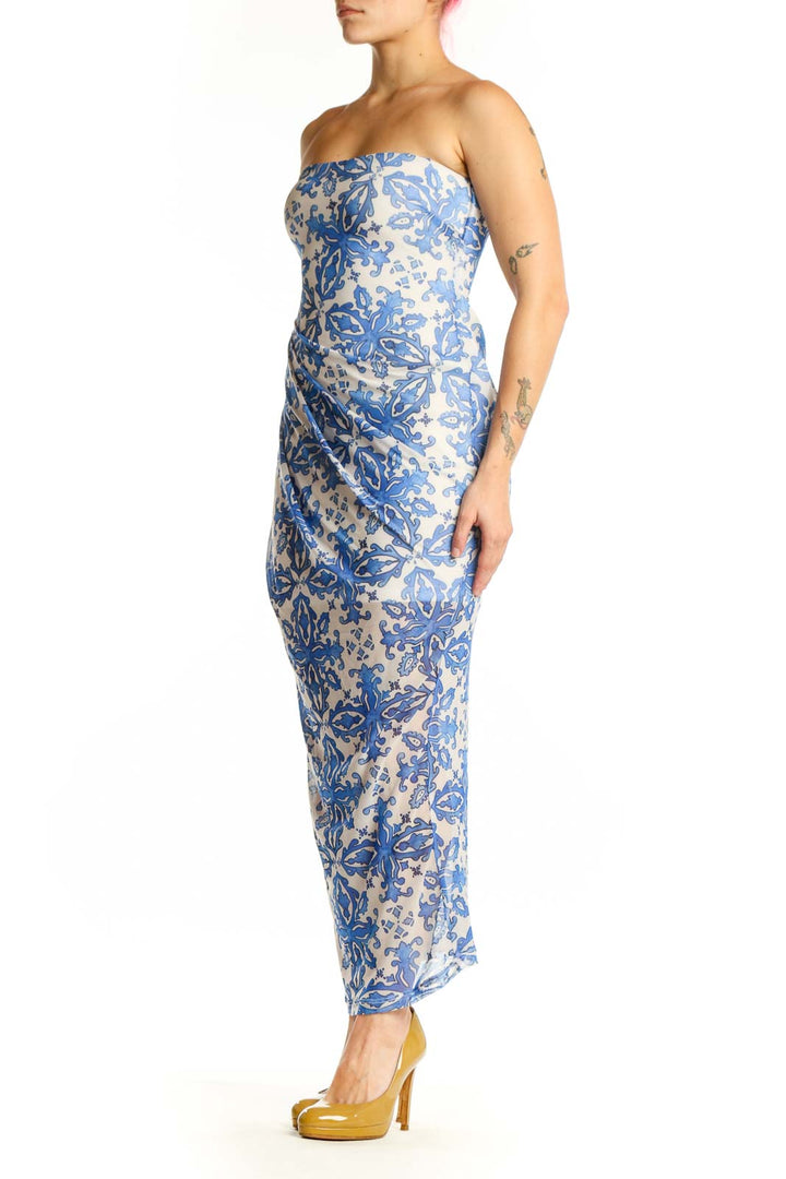 Blue and cream floral strapless maxi dress with fitted bodice and ruched detailing, front view