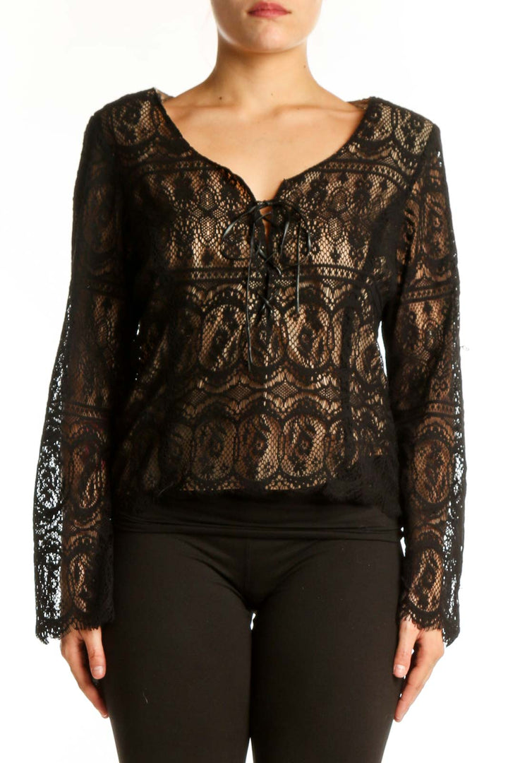 Black lace long sleeve top with geometric pattern and scoop neckline, front view