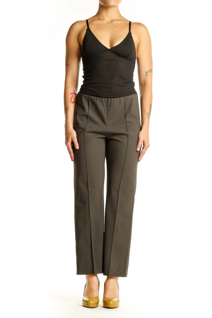 Olive green Athleta activewear pants front view, size M, nylon and spandex blend