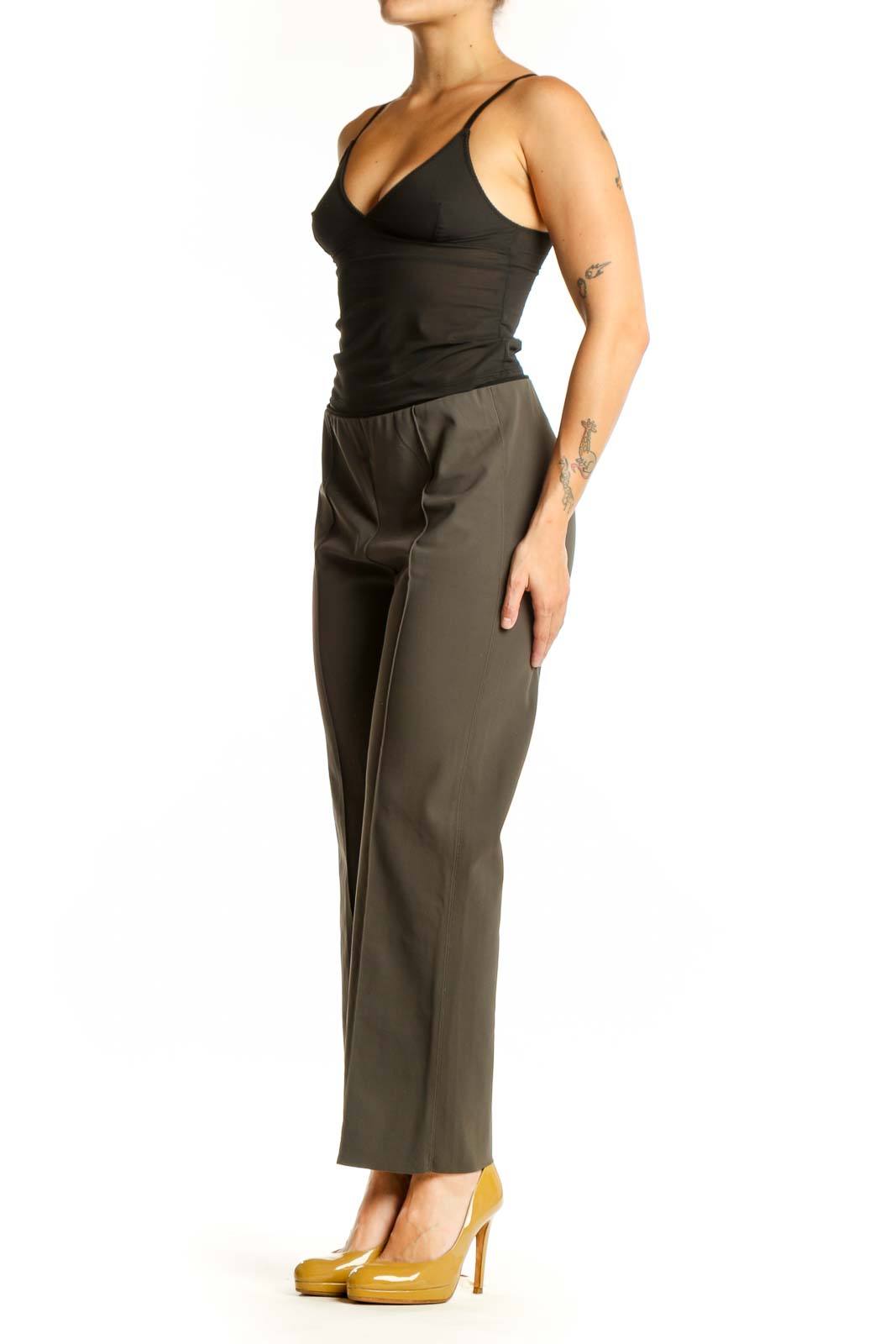 Olive green Athleta activewear pants front view, size M, nylon and spandex blend
