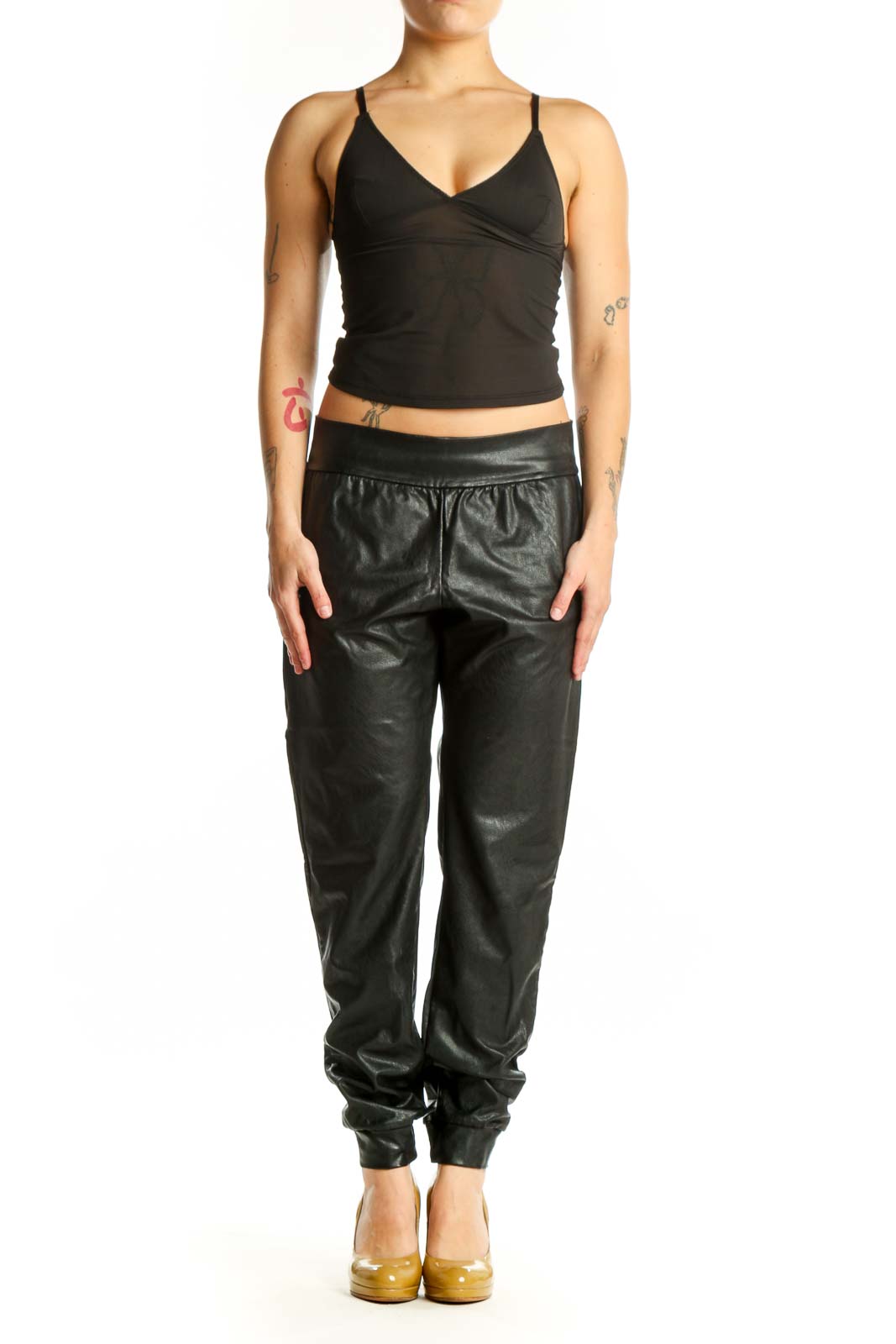 Black leather jogger pants with drawstring waist and tapered ankles, front view