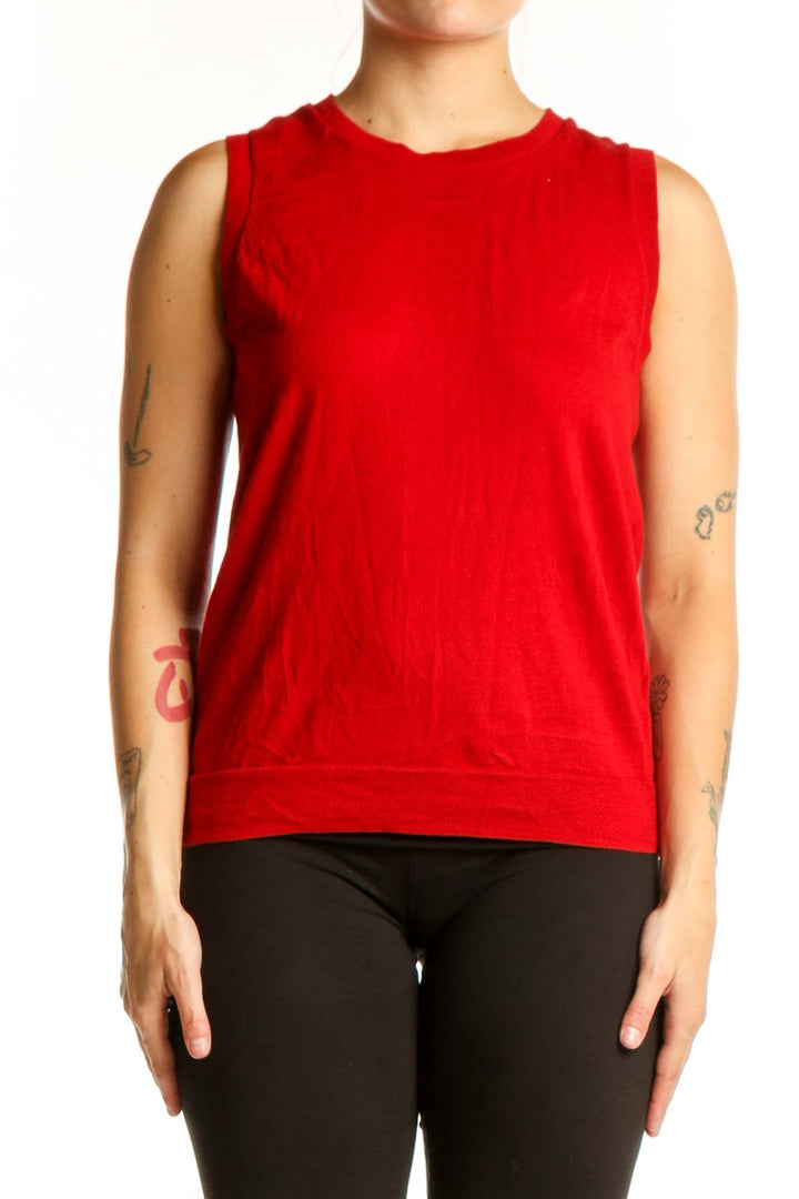 Red cotton sleeveless tank top with crew neckline, front view on model