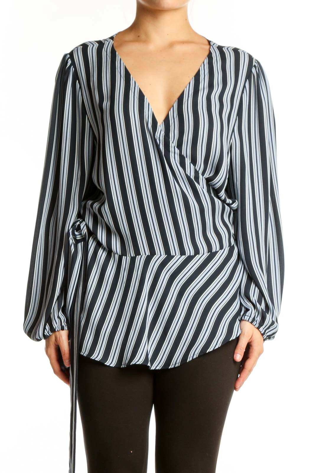 Navy and white striped wrap blouse with balloon sleeves, front view on model
