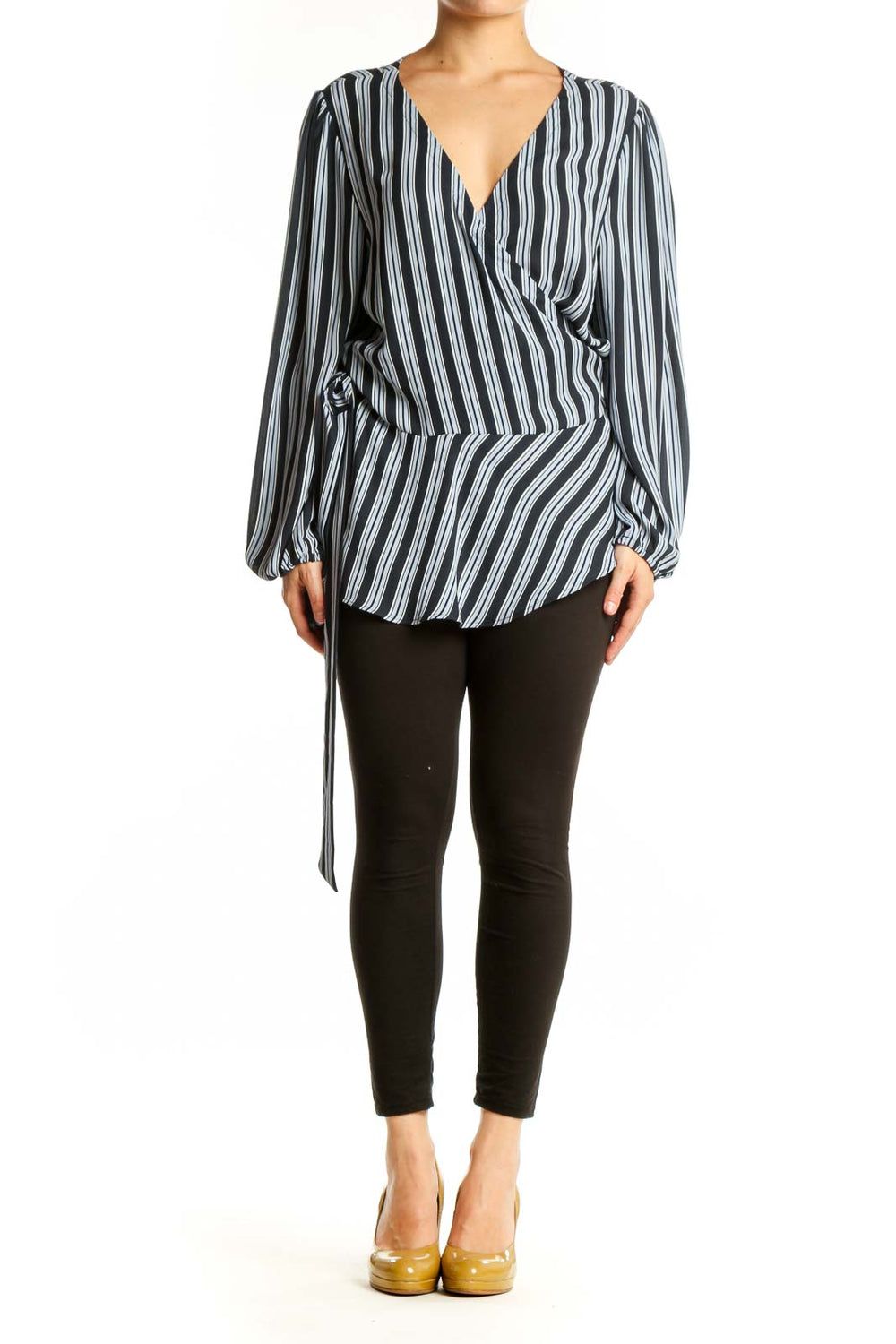 Navy and white striped wrap blouse with balloon sleeves, front view on model