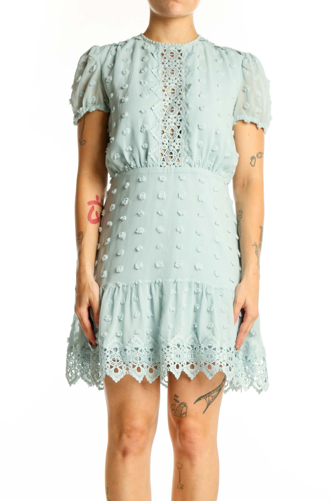 Cream textured lace mini dress with puffed sleeves and lace trim front view