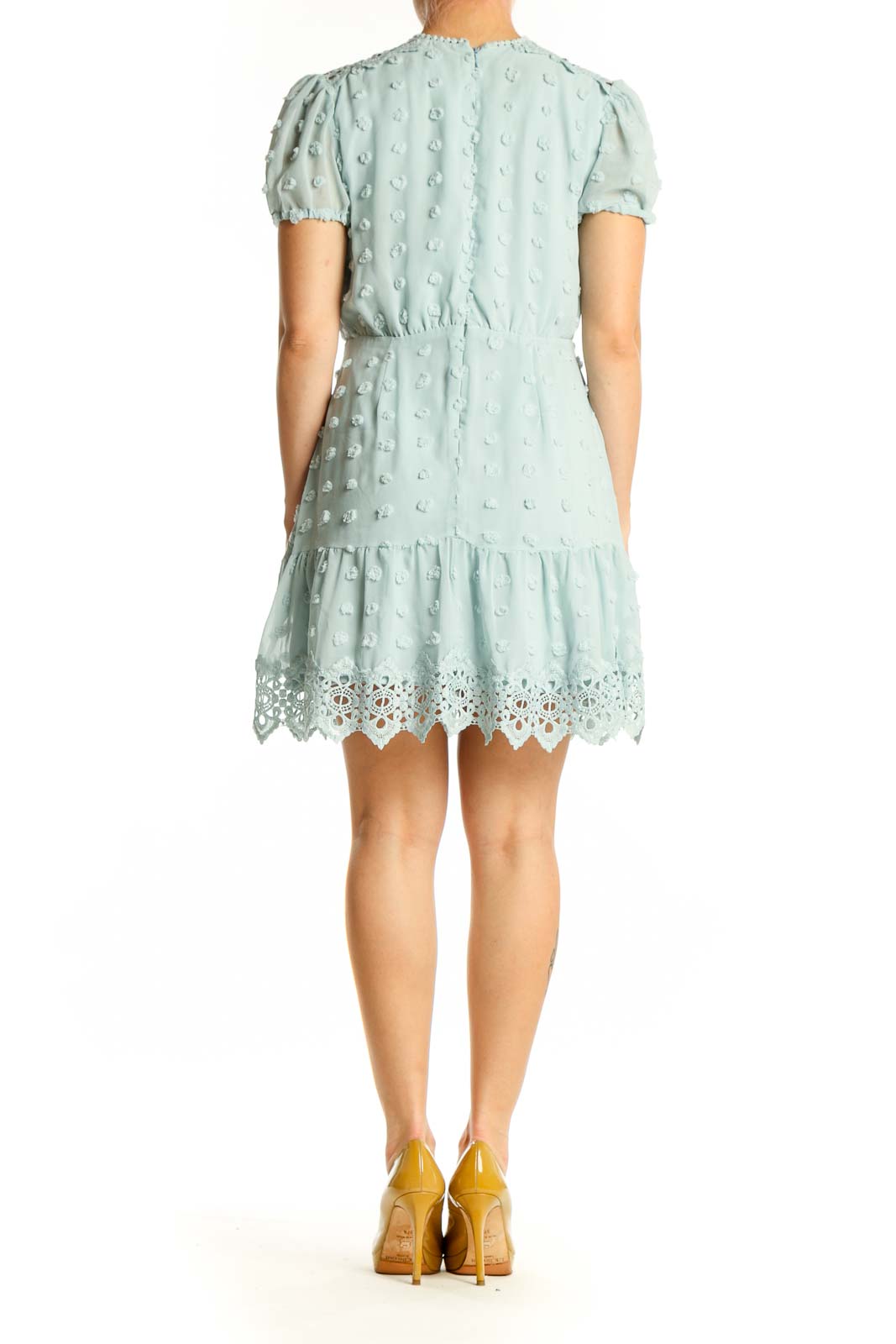 Cream textured lace mini dress with tiered ruffle hem back view