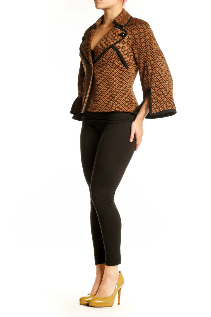 Brown geometric patterned Nine West blazer jacket with black notched collar and trim, front view on model