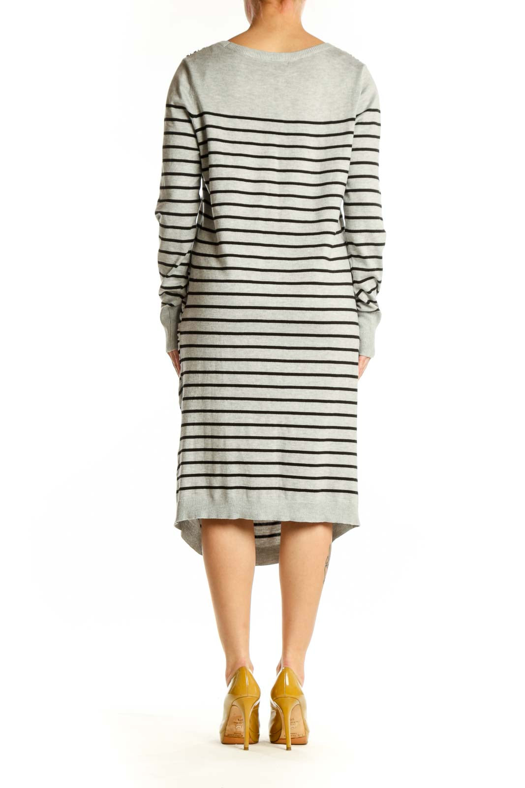 Back view of gray and navy striped long sleeve knit dress showing curved seaming and relaxed silhouette