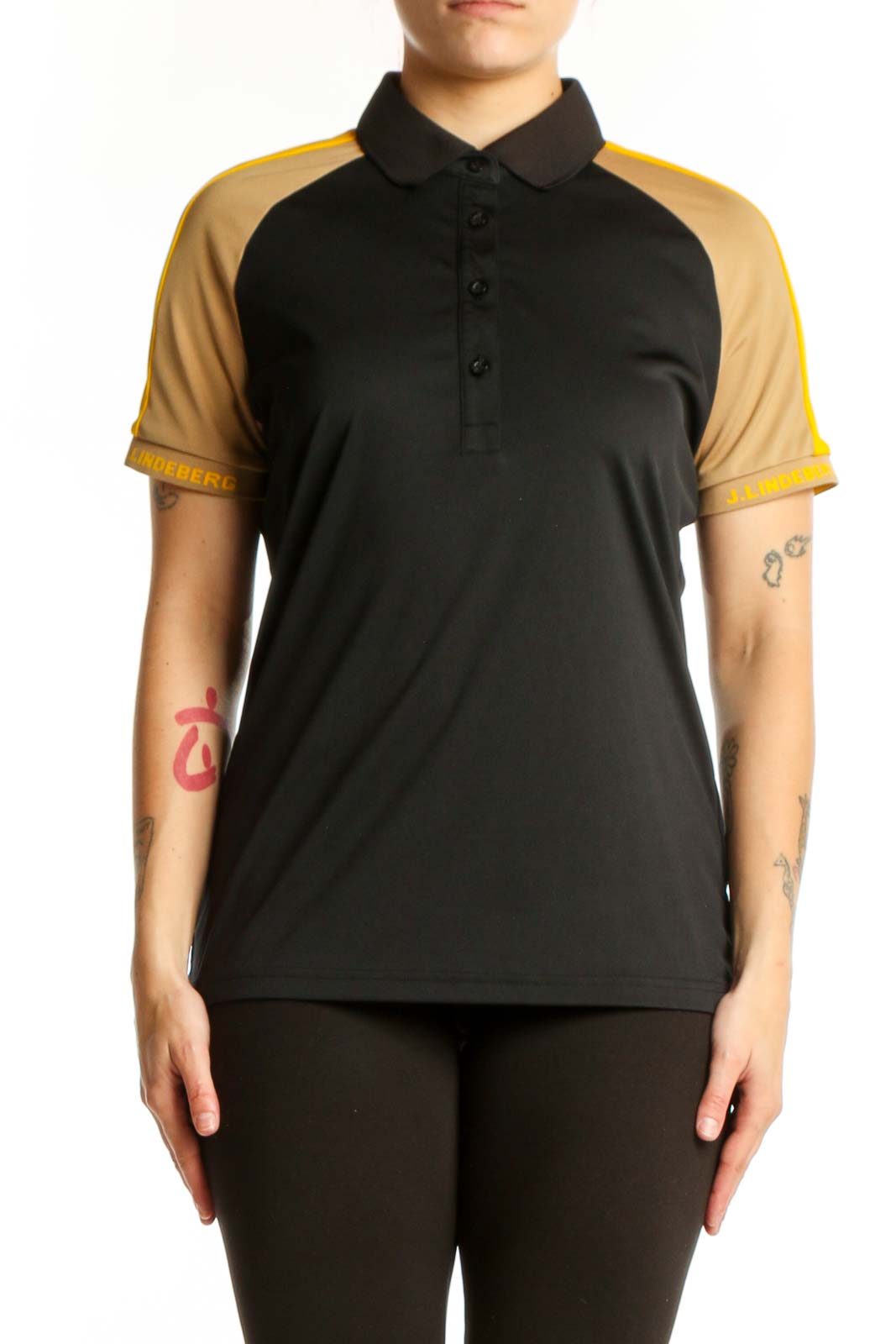 J. Lindeberg black and gold colorblock polo shirt front view, size L with collared neckline and button closure