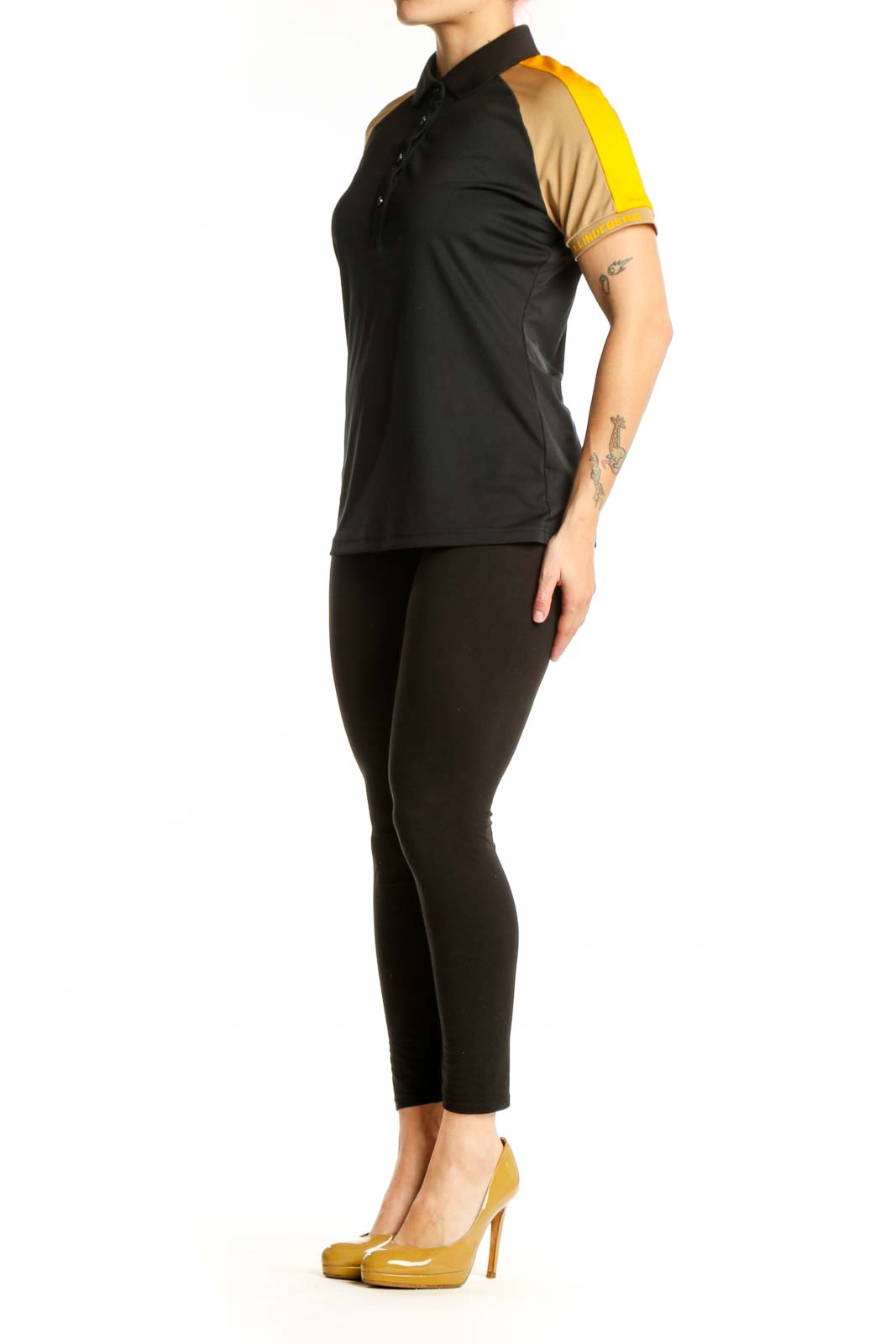 J. Lindeberg black and gold colorblock polo shirt front view, size L with collared neckline and button closure