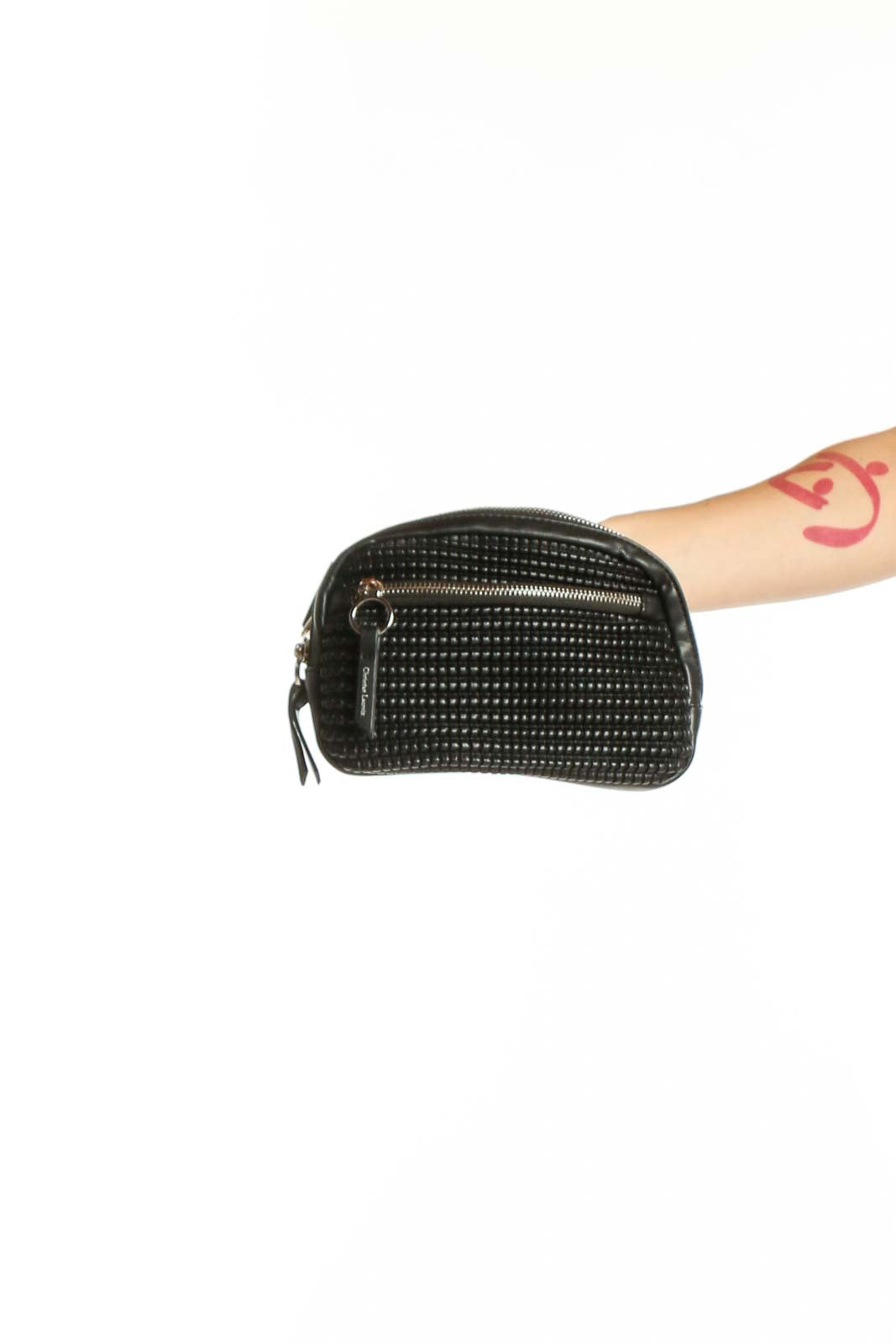 Black studded crossbody bag with zip closure and adjustable strap by Christian Lacroix