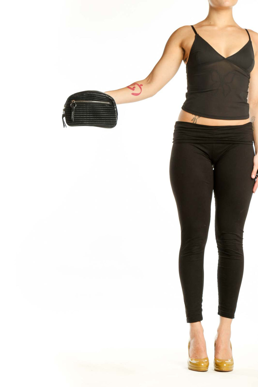Black studded crossbody bag with zip closure and adjustable strap by Christian Lacroix