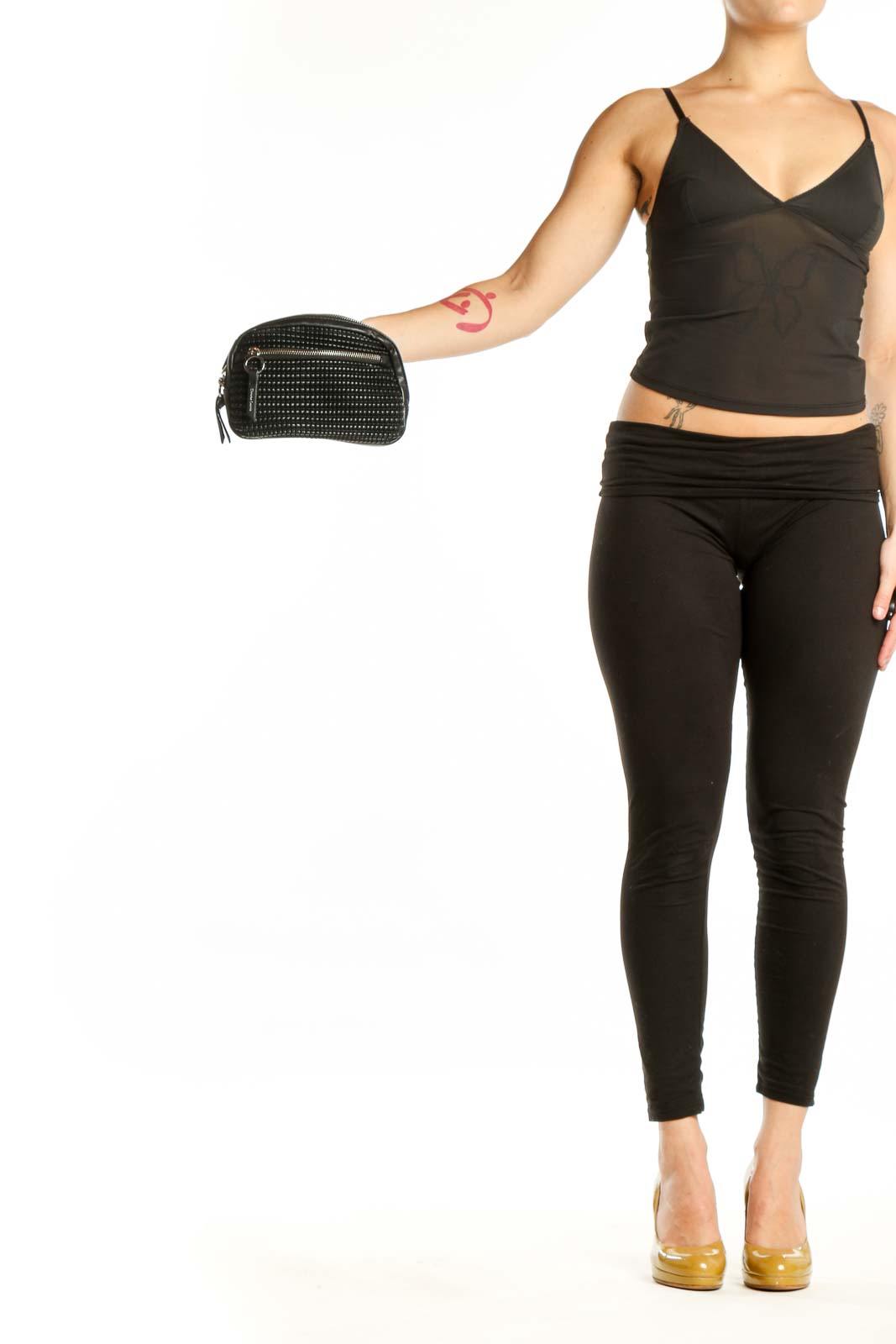 Black studded crossbody bag with zip closure and adjustable strap by Christian Lacroix