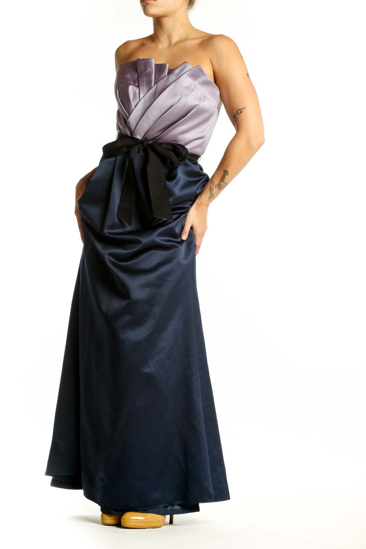 Navy strapless maxi dress with lavender pleated bodice and black bow waist accent by White by Vera Wang