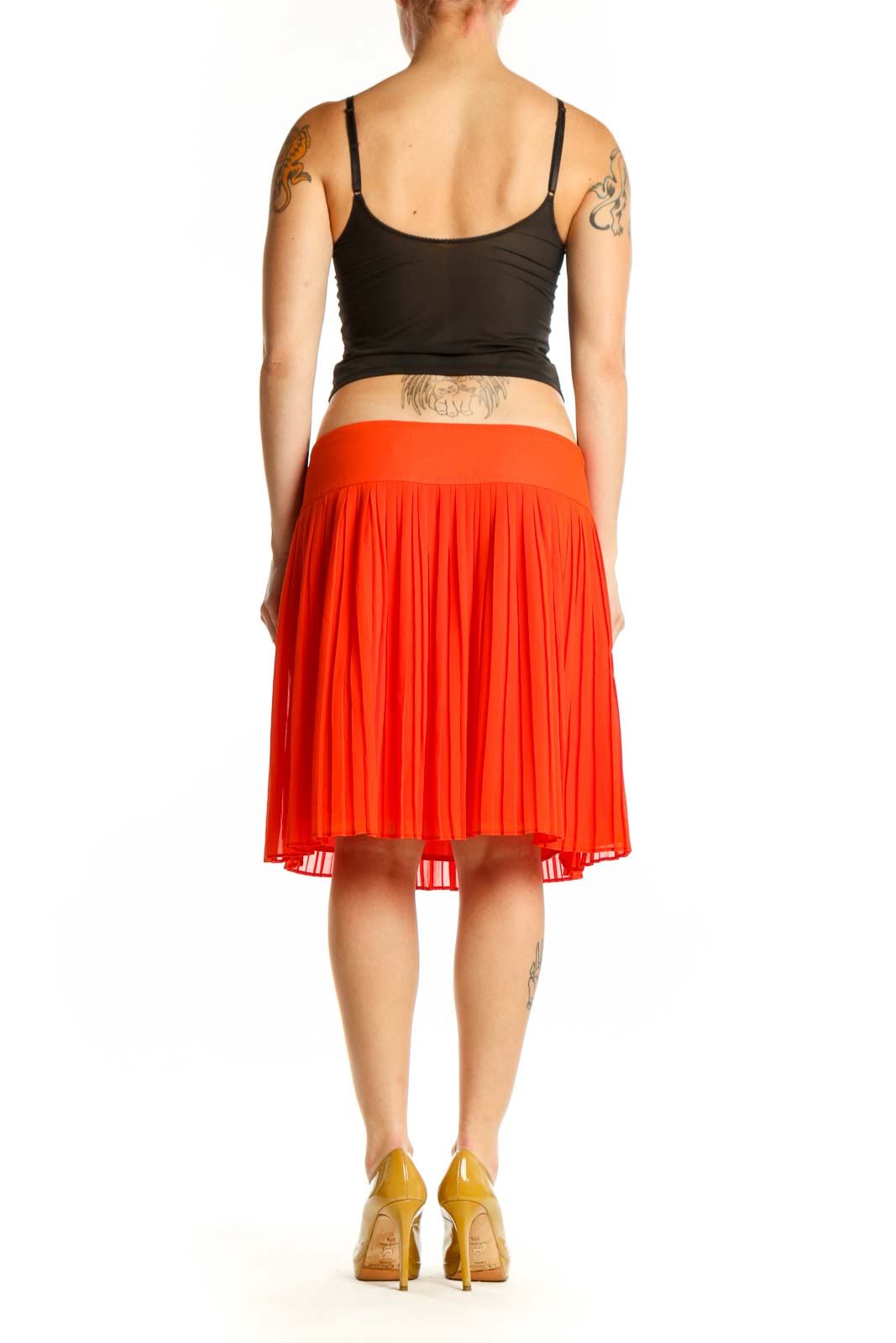Red pleated A-line knee-length skirt back view on model