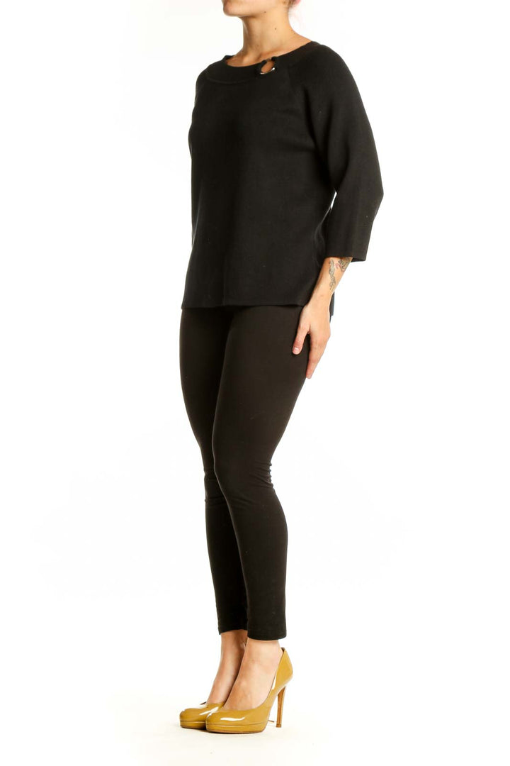 Black cotton top with keyhole neckline detail and 3/4 sleeves, front view