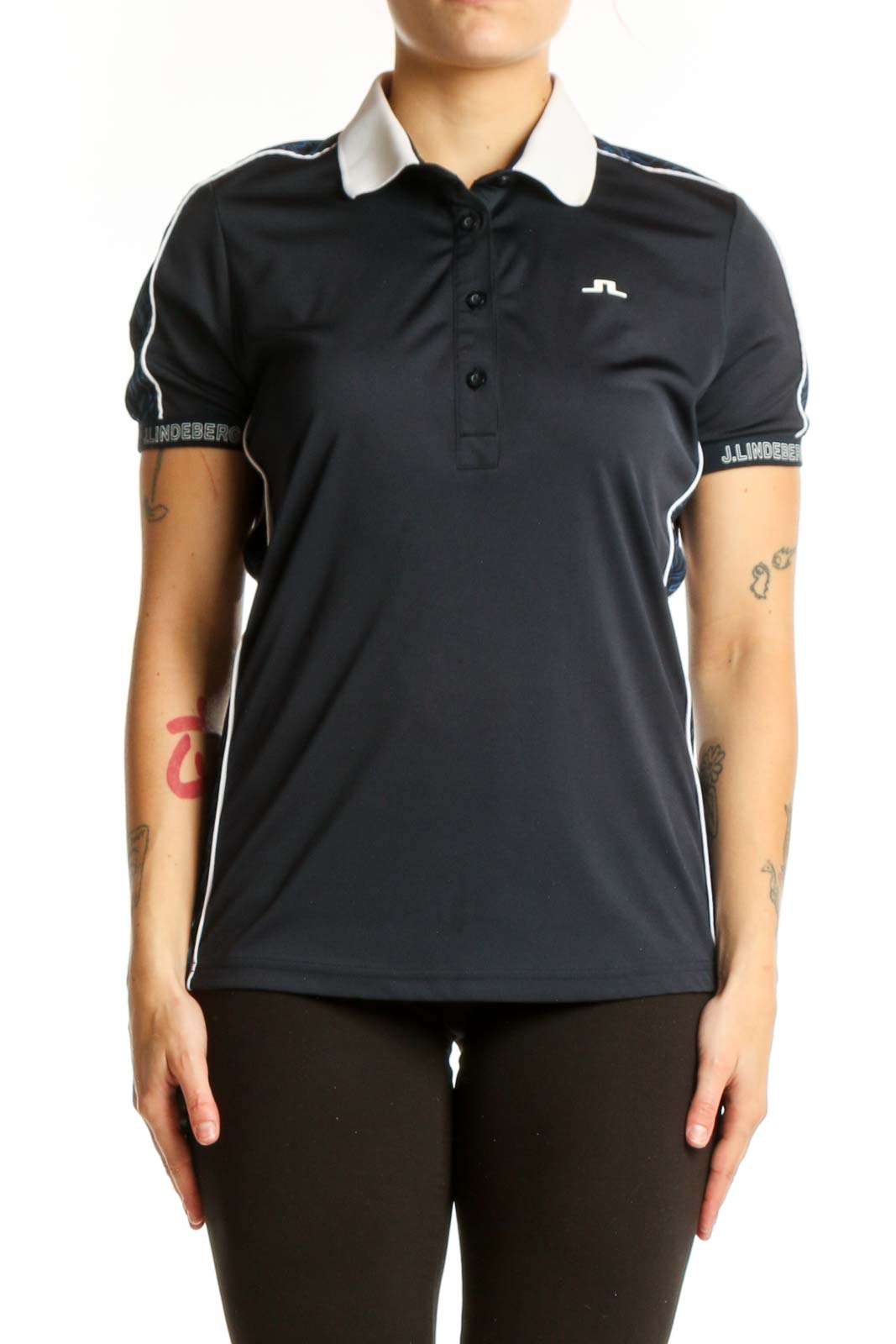 Black polo shirt with white collar and J. Lindeberg logo, front view