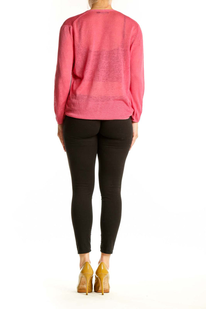 Pink linen viscose wrap top with wrap-front design, back view