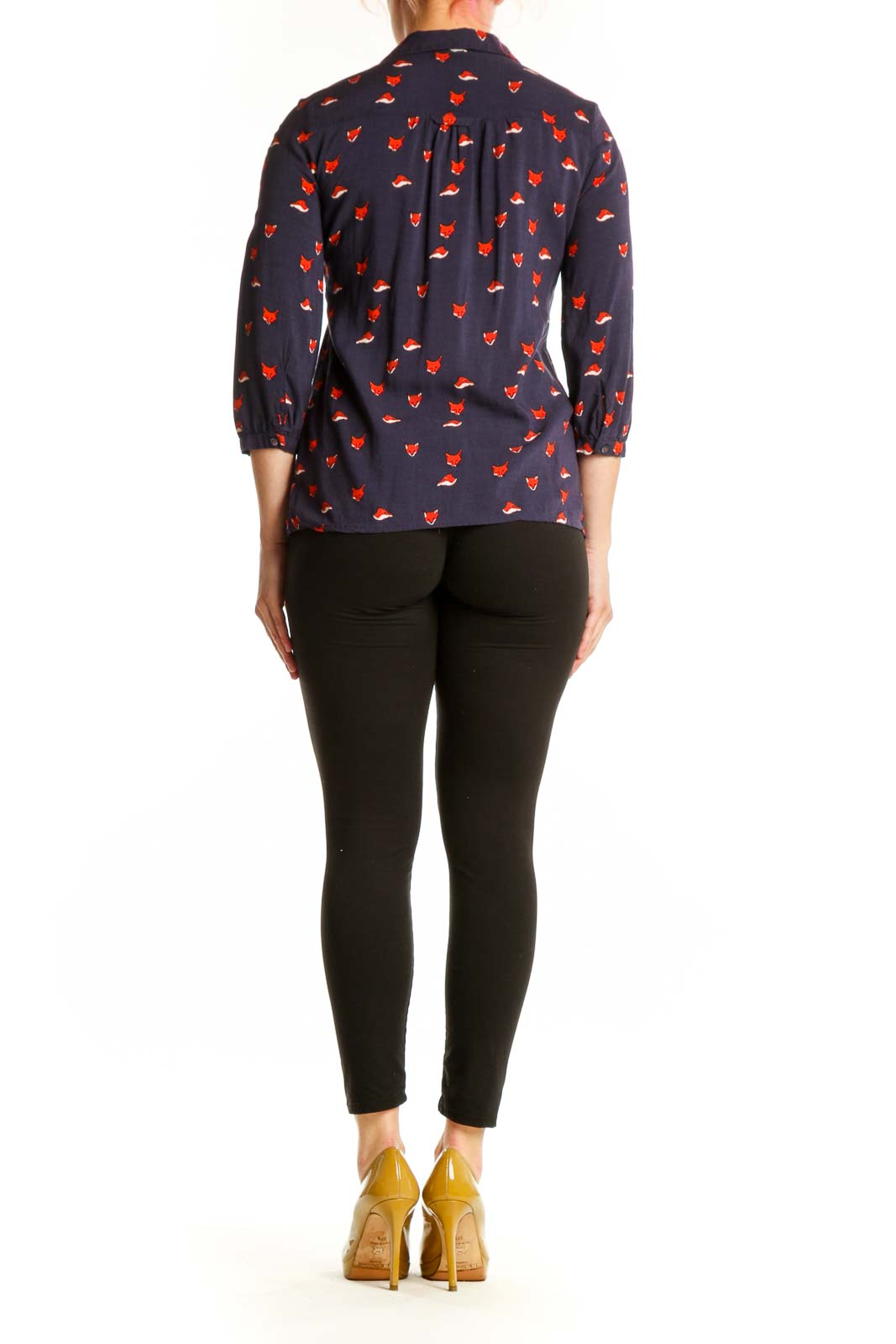 Back view of navy fox print Maeve top showing pleated bust detail and button closure