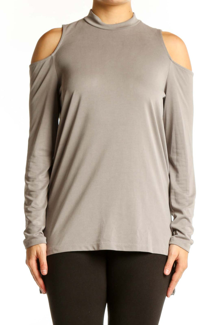 Beige cold shoulder long sleeve top with crew neckline, front view on model