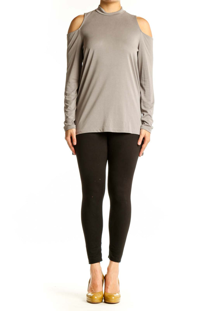 Beige cold shoulder long sleeve top with crew neckline, front view on model