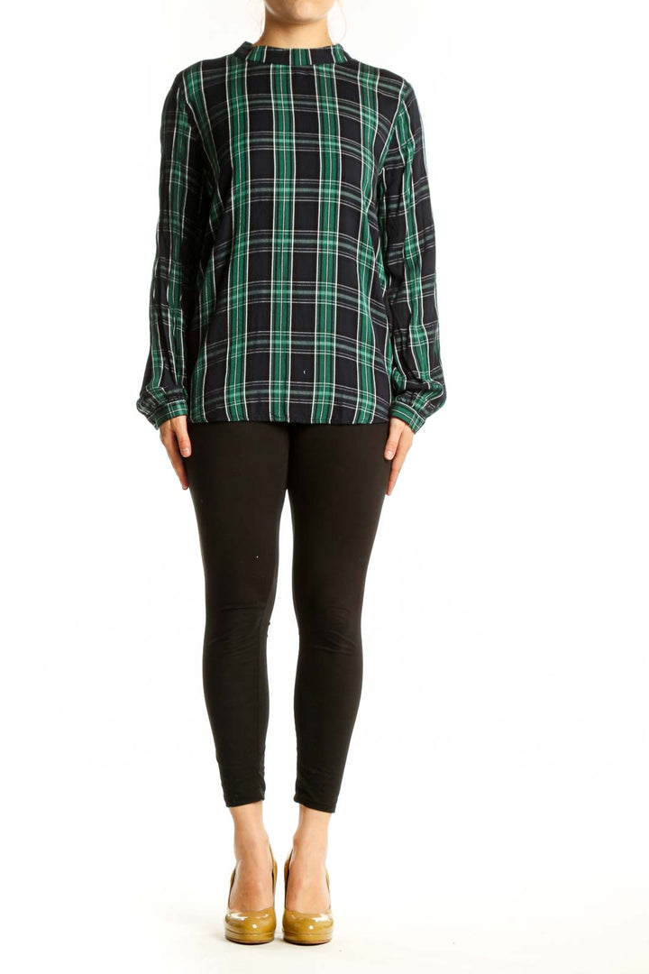 Front view of green and black plaid rayon long sleeve top with crew neckline and gathered cuffs