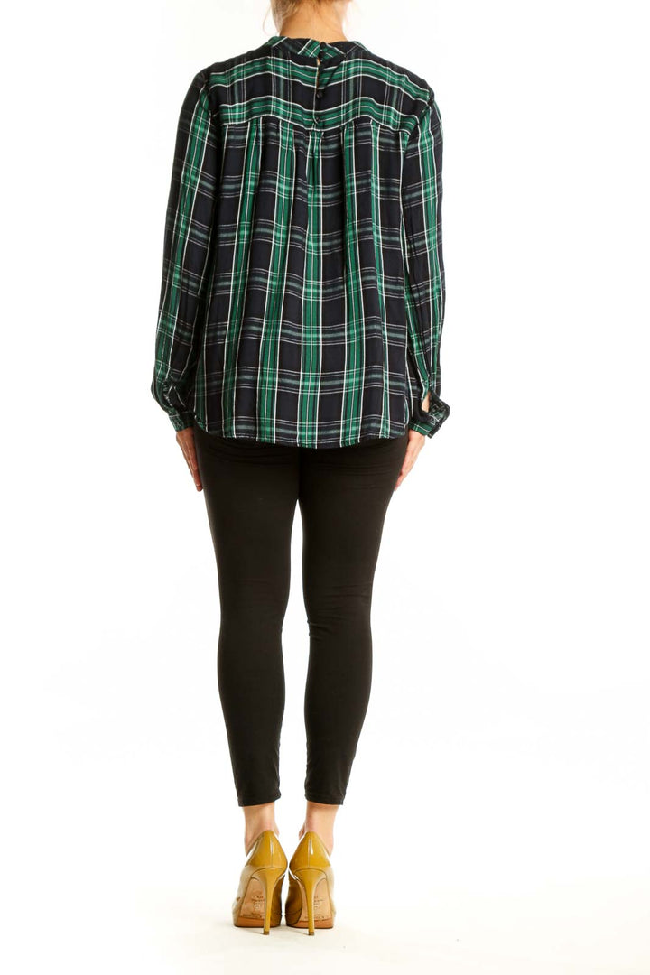 Back view of green and black plaid rayon long sleeve top showing full plaid pattern and relaxed fit