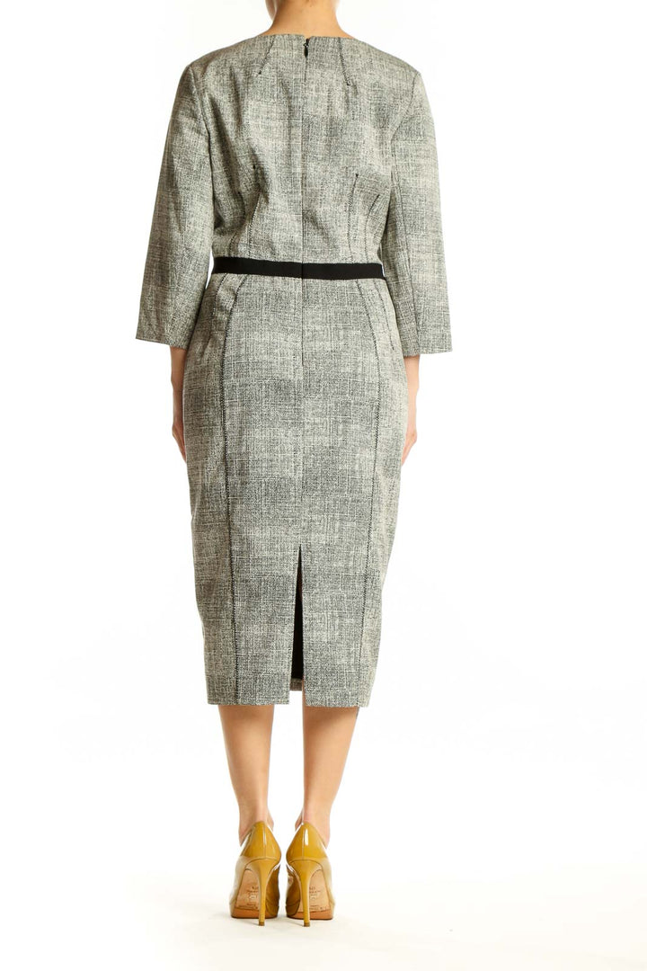 Gray linen midi dress with black waist belt and three-quarter sleeves, back view