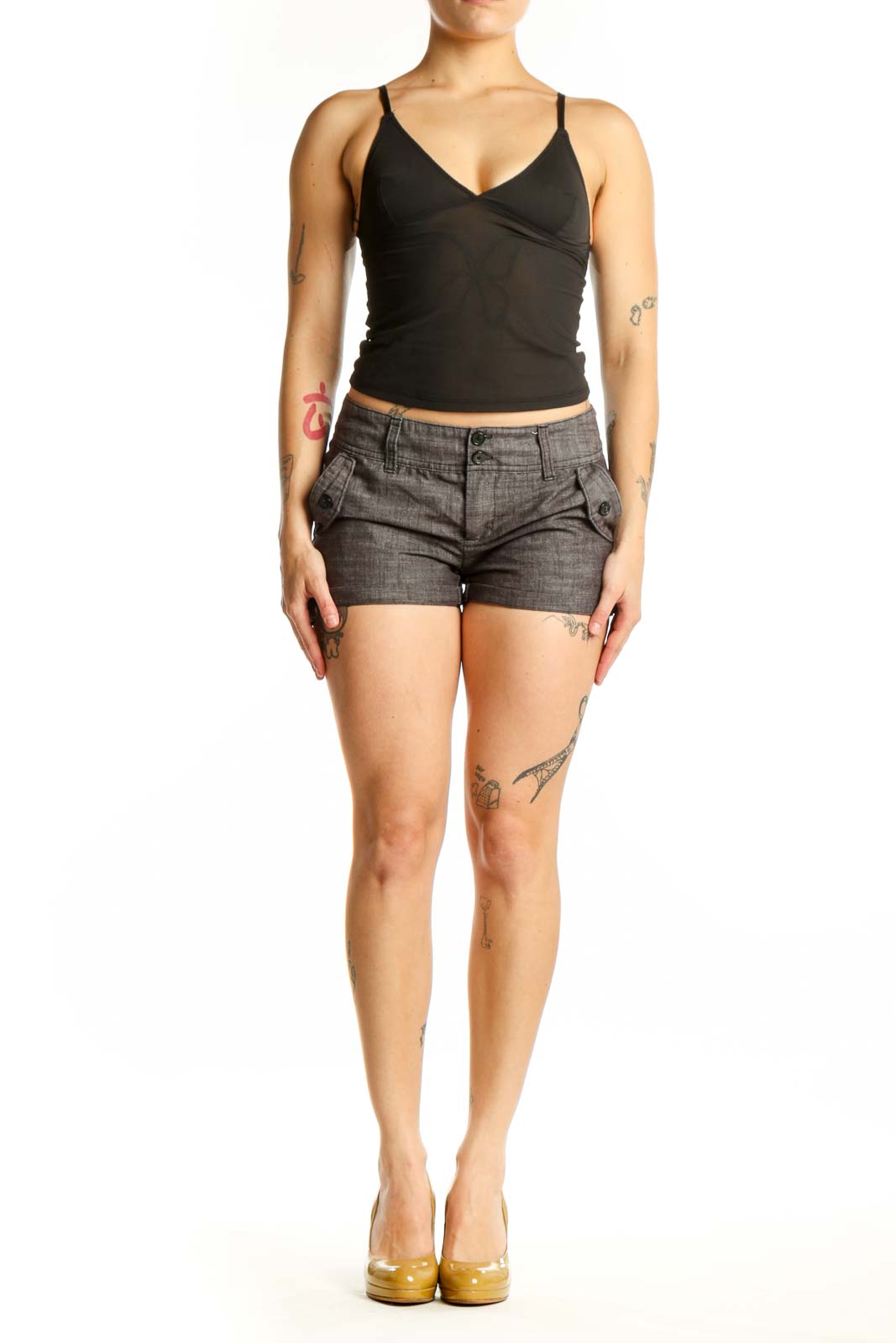 Gray denim shorts with flap pockets and classic five-pocket design, front view on model